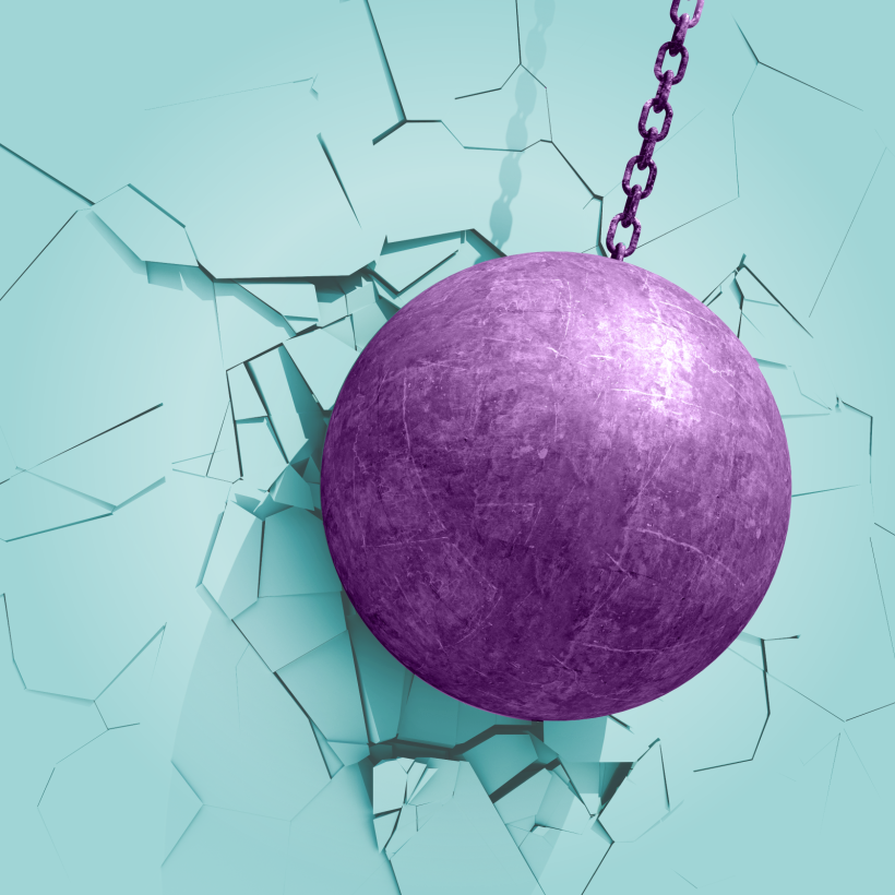 Visuel d'une boule de démolition cassant un mur.